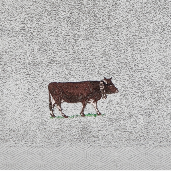 Kuh Handtuch bestickt mit dunkelbrauner Allgäu Kuh Grundfarbe grau